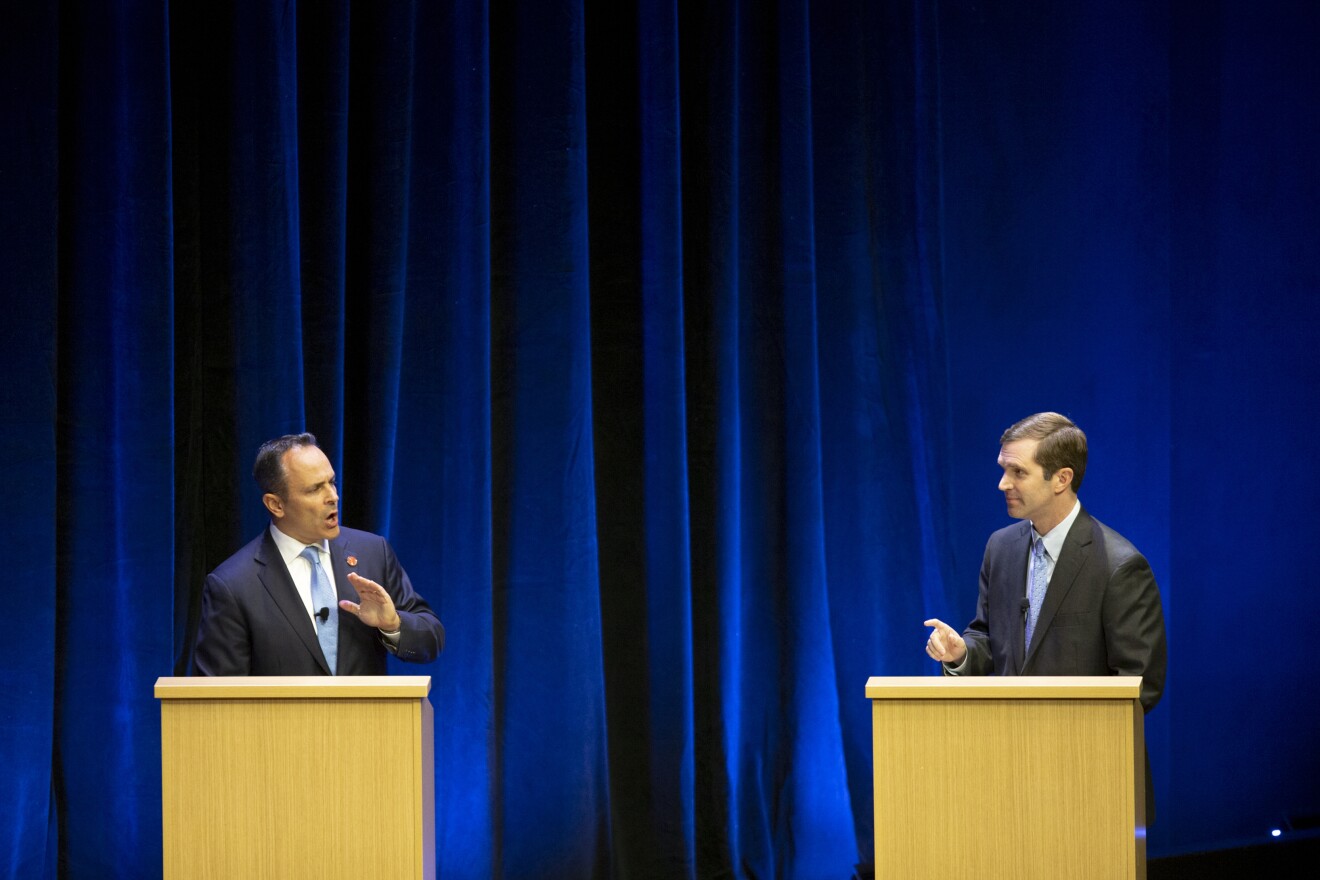 Republican Gov. Matt Bevin, left, and Democratic Attorney General Andy Beshear participate in a debate at the Singletary Center for the Arts on the University of Kentucky campus in Lexington, Ky., Tuesday, Oct. 15, 2019. 